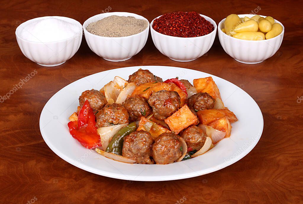very nice meatballs with fragrant Turkish spices on a barbecue plate
