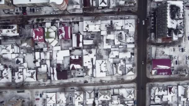 Flying over the streets and houses in Russia in the winter — Stock Video