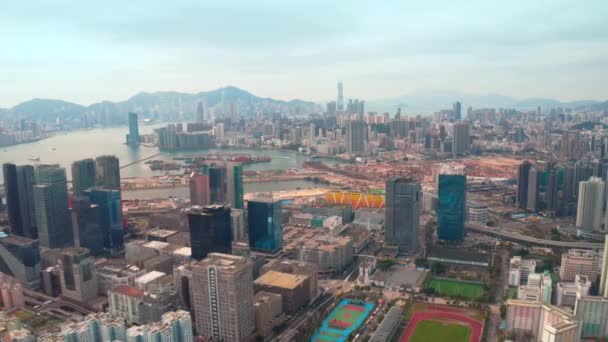 Streets, roads, apartment houses and skyscrapers in Hong Kong, aerial view — Stock Video