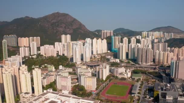 Hong Kong, China - 2020: skyscrapers and apartment houses, aerial view — Stock Video