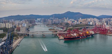 Hong Kong, China - 2020: Rambler Channel, bridges and ship with containers