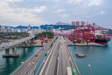 Hong Kong, China - 2020: Tsing Yi South Bridge, ship with containers from above