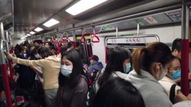Hong Kong, China - 2020: people ride the subway