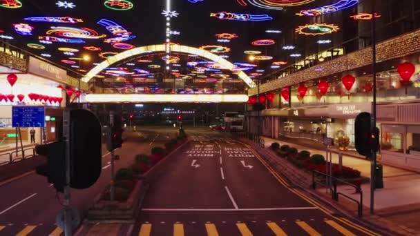 Hong Kong, China - 2020: luminous garlands over Mody Road at night from above — Stock Video