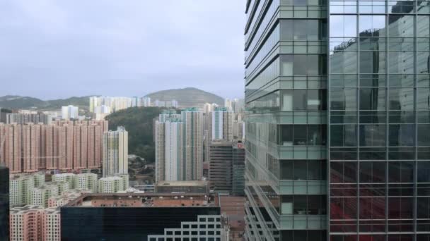 Hong Kong - 2020: Office Buildings - Exchange Tower and One Kowloon from above — Stockvideo