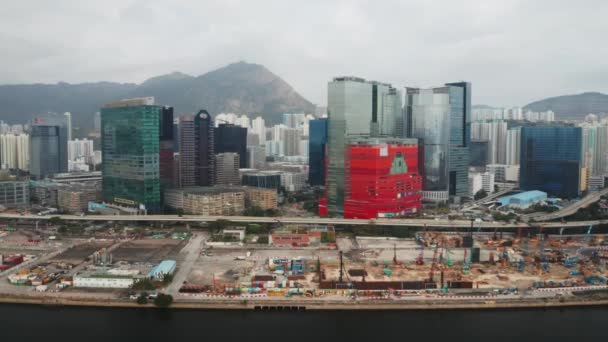 Hong Kong - 2020: Kowloon Bay, highway and skyscrapers from above — Stock video