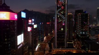 Hong Kong, China - 2020: night city lights, streets and skyscrapers from above