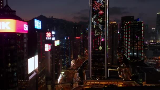 Hong Kong, China - 2020: night city lights, streets and skyscrapers from above — ストック動画