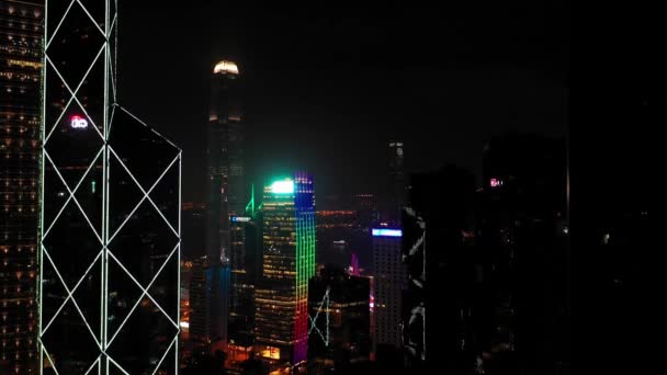 Hong Kong - 2020: skyscrapers in night illumination from above — Stok video