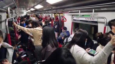Hong Kong, China - 2020: people ride the subway