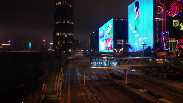 Hong Kong, China - 2020: screens on Tsim Sha Tsui Center and Empire Center — Stock Video