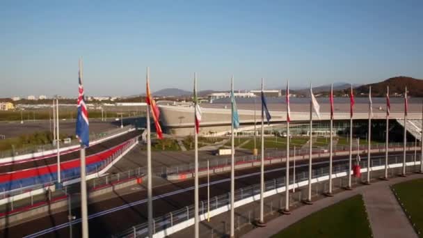 Sochi, Russia - 2014: Sochi Olympic Park, square with flags and race track — 图库视频影像