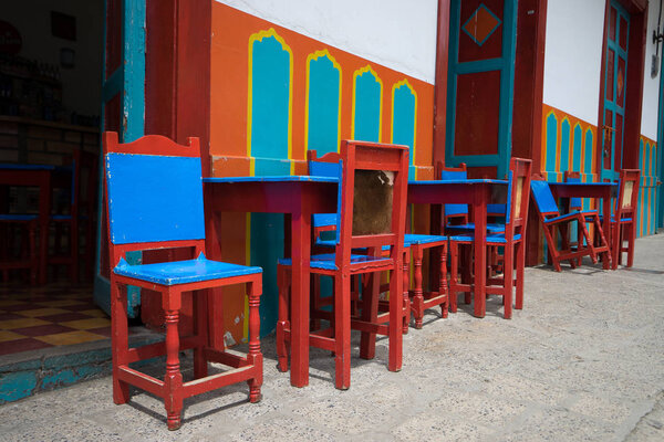 Traditional Colombian leather back chairs in coffee house