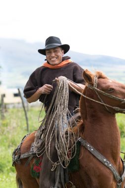at sırtında Ekvator kovboy