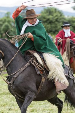 Ekvador işleme Kement atlı and kovboy