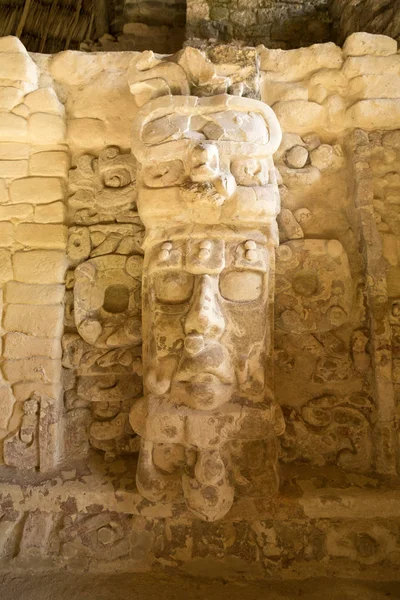 well preserved statue on the Temple of the Masks at Kohunlich ruins