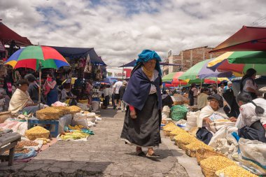 people in the Saturday market in Otavalo,Ecuador clipart