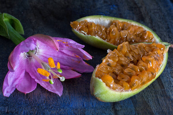 cut passion fruit and flower also known as taxo or curuba 