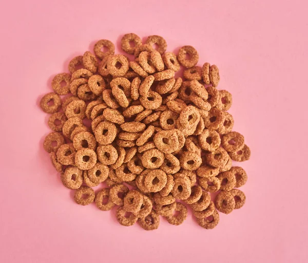 Pile Cornflakes Cereali Sfondo Rosa Vista Dall Alto — Foto Stock