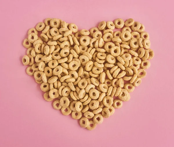 Heart Made Flakes Cereal Pink Background Royalty Free Stock Images