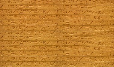 Closeup of old Egyptian hieroglyphs carved on stone  clipart