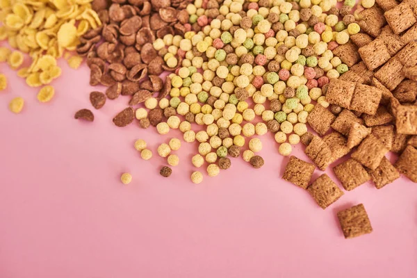 Fiocchi Mais Cereali Diversi Tipi Sfondo Rosa — Foto Stock