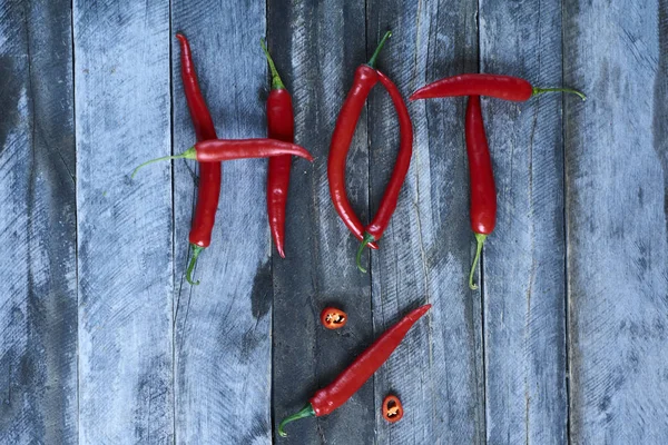 Hot sale. Red chili pepper poster. Top view of text made of red chili peppers