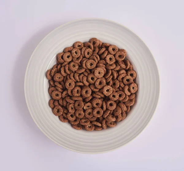 Fehér Lemez Csokoládé Kukorica Gyűrű Felülnézet — Stock Fotó