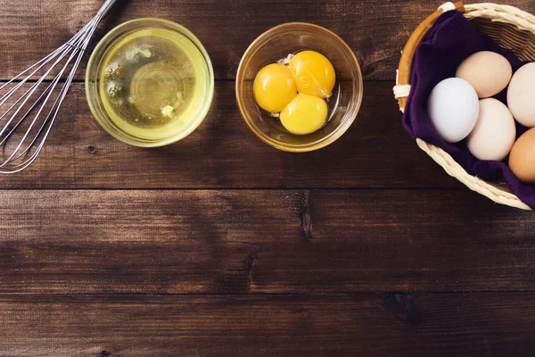 Separated Eggs White Yolks Glass Bowls Whisk Dark Brown Rustic — Stock Photo, Image