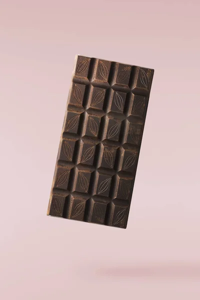 Zamatos sötét csokoládé a háttérben — Stock Fotó