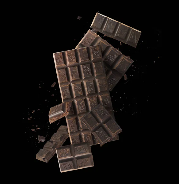 Tasy mörk chokolate på bakgrunden — Stockfoto