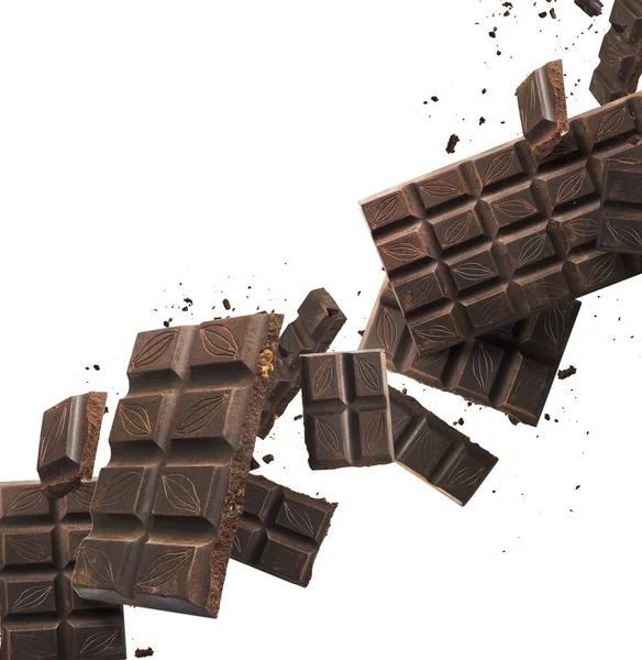 Tasy escuro chokolate no fundo — Fotografia de Stock