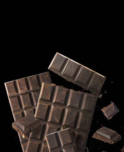 Tasy dark chokolate on background — Stock Photo, Image