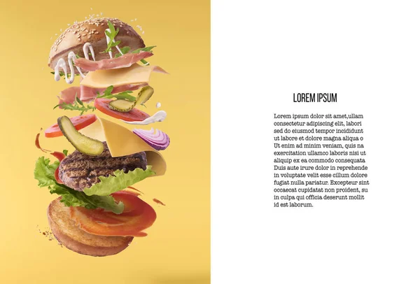 Lahodný burger s létajícími ingrediencemi — Stock fotografie