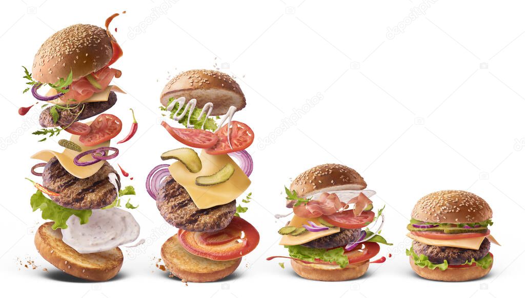 Delicious burger with flying ingredients isolated on white backg