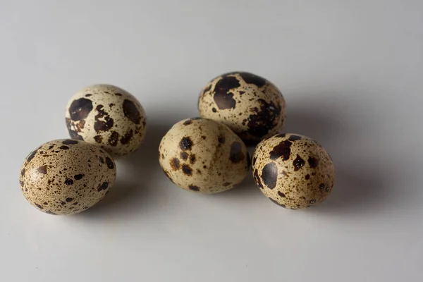 Partridge eggs on the white background — Stock Photo, Image