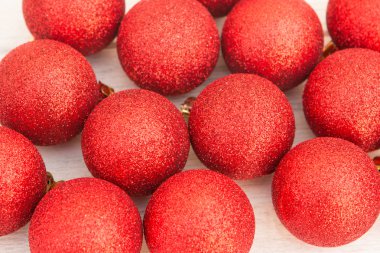 Red Christmas balls with glitter clipart