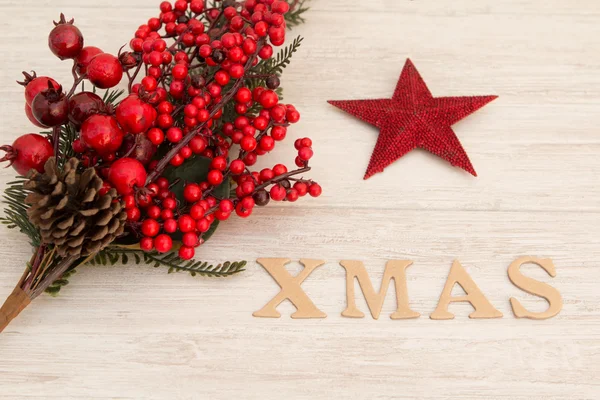 Piros karácsonyi csillag a szót karácsony — Stock Fotó