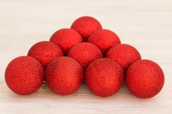 Red Christmas balls with glitter triangle shaped — Stock Photo, Image