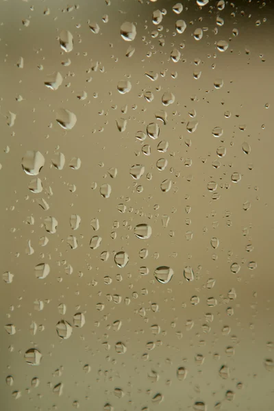 Glass with drops of rain water — Stock Photo, Image