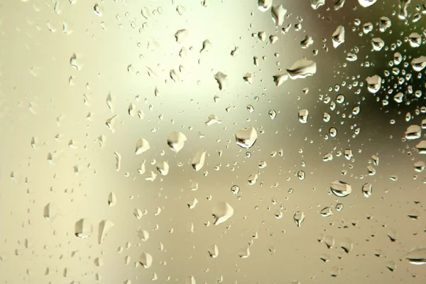 Glass with drops of rain water — Stock Photo, Image