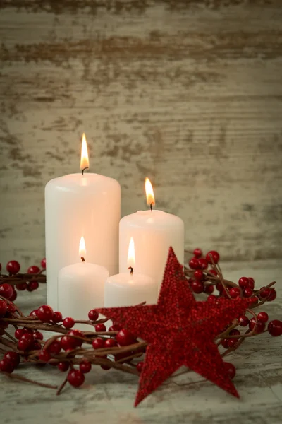Burning candles in a Christmas setting — Stock Photo, Image