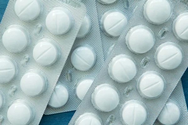 Embalagens de comprimidos brancos — Fotografia de Stock