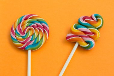 Two lollipops with many colors  clipart