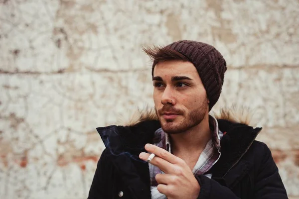 Attractive guy with wool hat — Stock Photo, Image