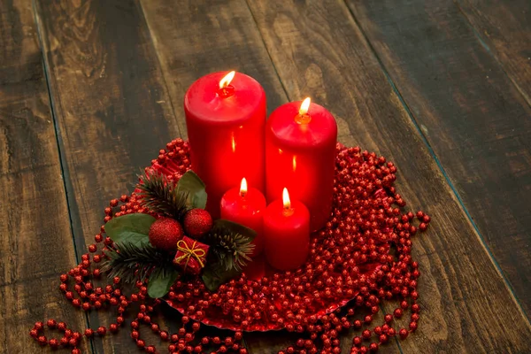 Red candles and christmas decor — Stock Photo, Image
