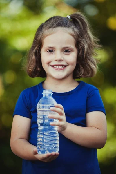 Cute little girl in park — Stock Photo, Image