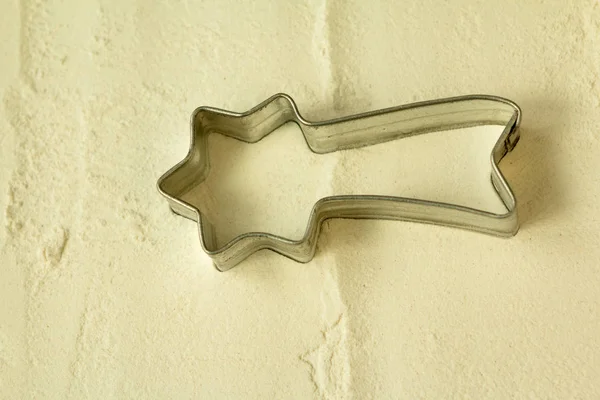 Falling star mold on flour — Stock Photo, Image