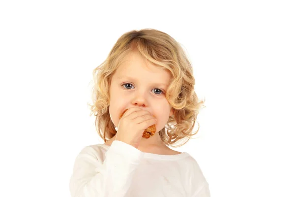 Bambino biondo che mangia croissant — Foto Stock