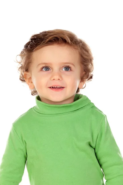 Förtjusande baby boy i grön tröja — Stockfoto